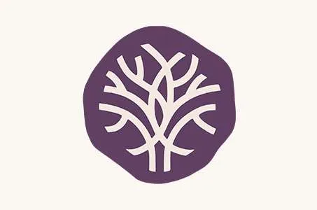 a purple and white tree logo on a white background