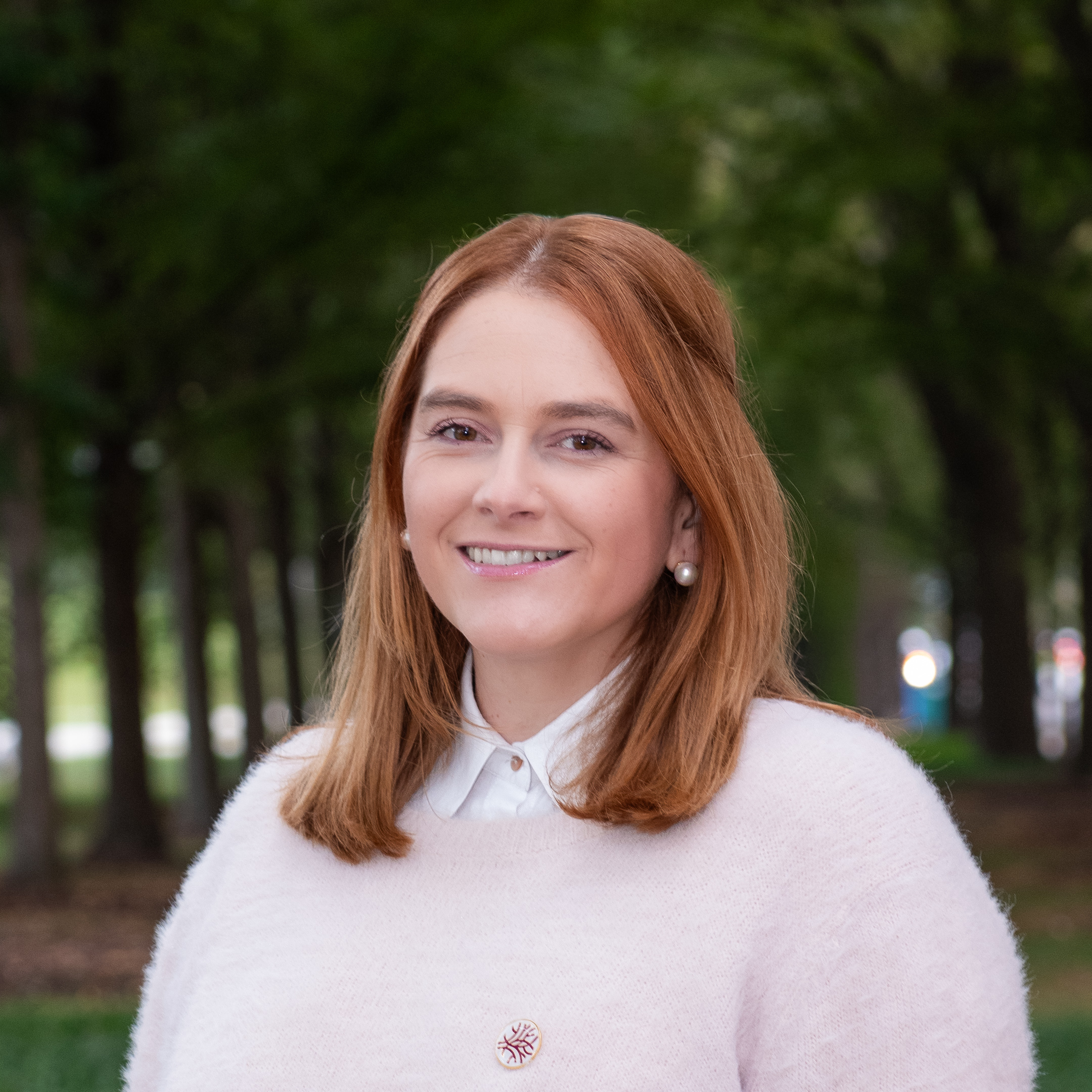 Headshot Openlands Headshot of Openlands' Public Relations and Content Specialist Claudia Latapi with trees in the background
