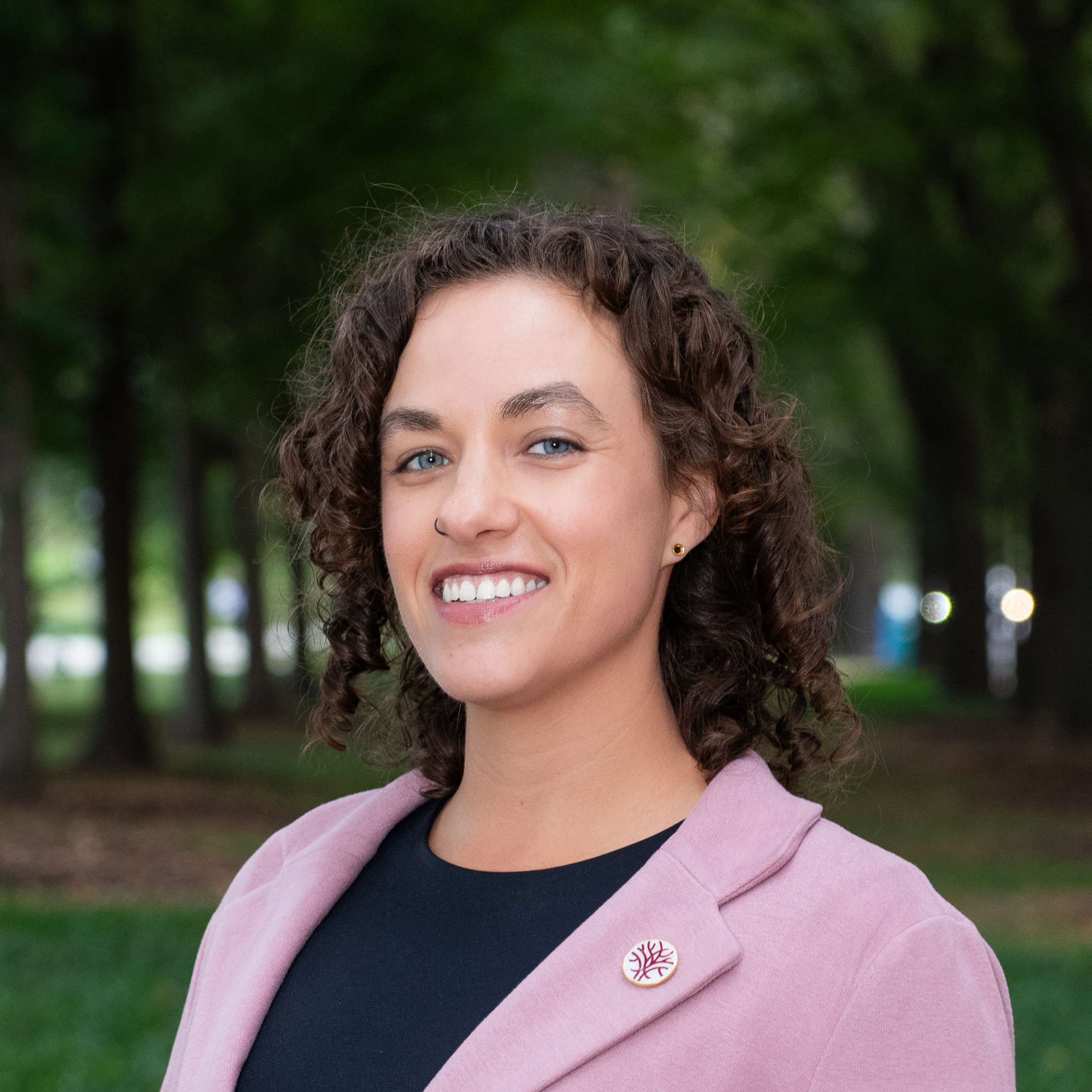 Headshot Openlands Land Preservation Specialist Kim Elsenbroek with trees in the background