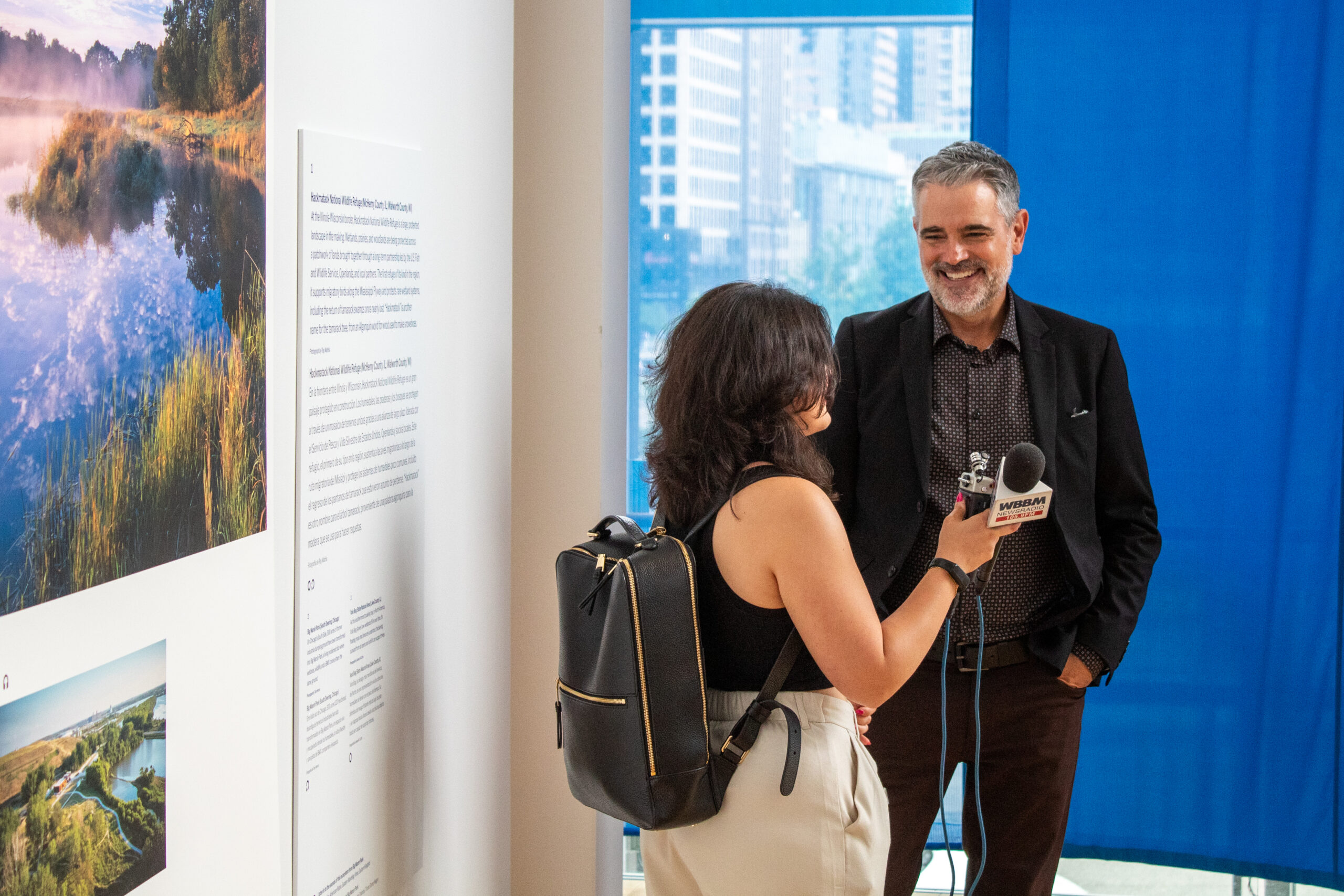 Openlands CEO, Michael Davidson, smiling and speaking to reporter